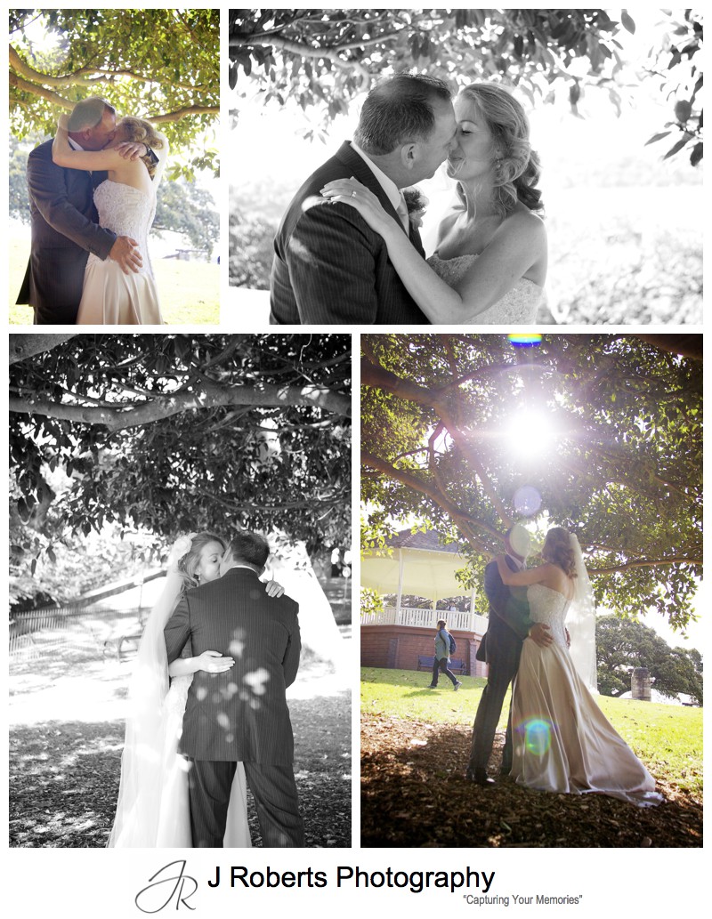 Couple kissing under fig trees at observatory hill - wedding photography sydney